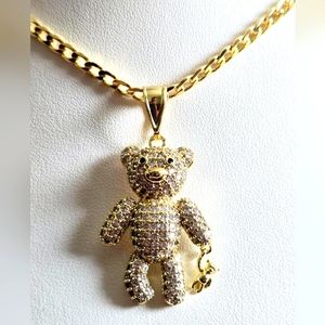 Cuban chain 22 inch bear pendant with your own bear in one hand. Laminated gold